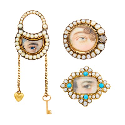 Lot 1180 - Antique Three Gold, Low Karat Gold, Split Pearl, Turquoise and Diamond 'Lover's Eye' Pins