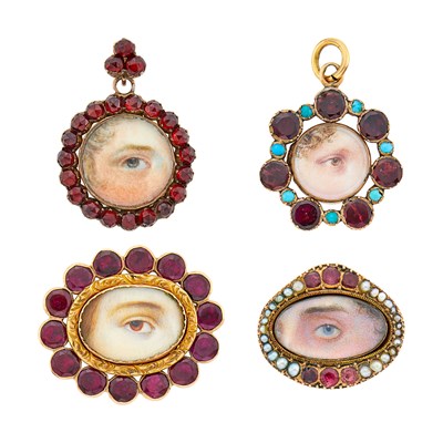 Lot 1184 - Antique Two Low Karat Gold, Gold-Filled, Garnet, Turquoise and Split Pearl 'Lover's Eye' Pendants and Two Pins