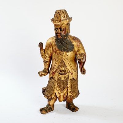 Lot 145 - A Large Chinese Gilt Lacquered Wood Figure of a Guardian