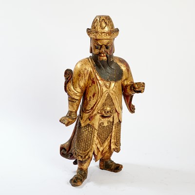 Lot 145 - A Large Chinese Gilt Lacquered Wood Figure of a Guardian
