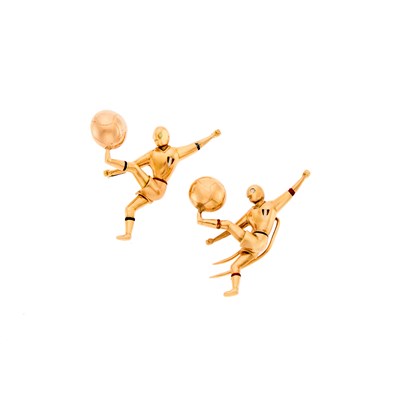 Lot 1250 - Two Gold and Enamel Soccer Player Clips