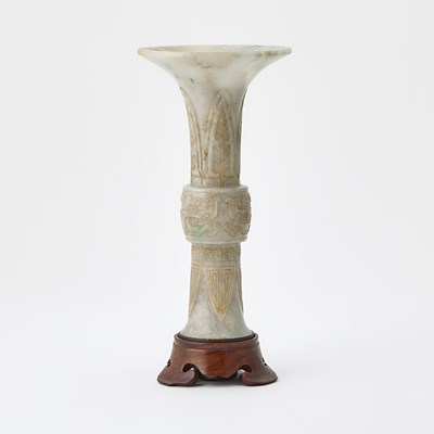 Lot 26 - A Chinese Carved Jadeite Archaistic Gu Vase