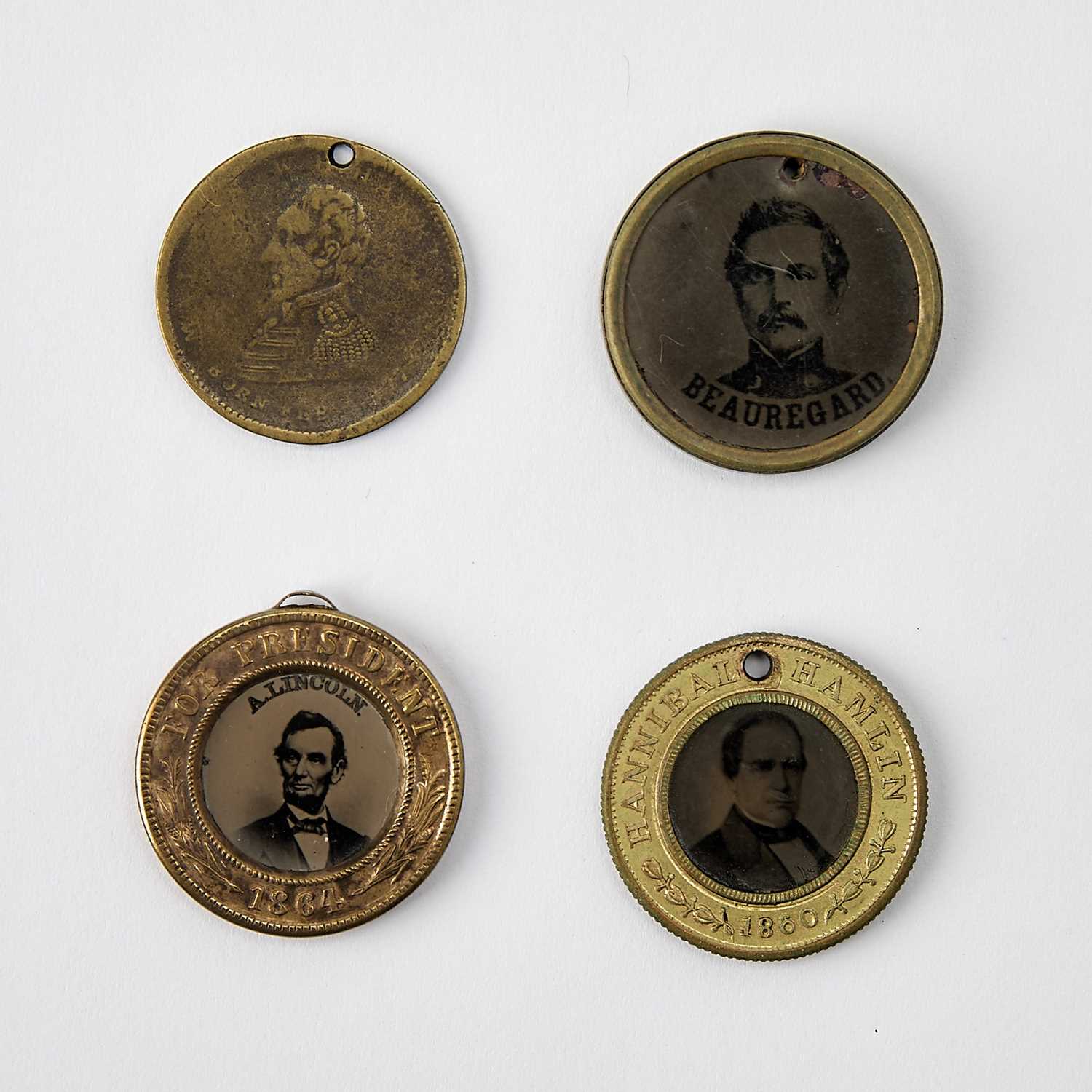 Lot 41 - Lincoln presidential campaign ferrotypes and commemorative mourning buttons