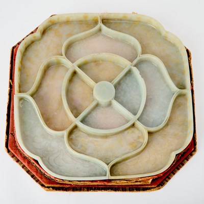 Lot 70 - A Rare Chinese Carved Jadeite "Sweetmeat" Set with Silk and Card Stand