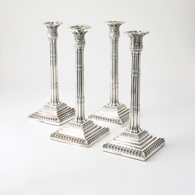 Lot 77 - Assembled Set of Four George III Sterling Silver Candlesticks