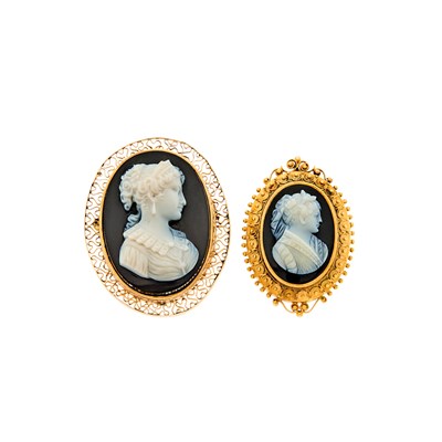 Lot 1183 - Two Gold, Low Karat Gold and Black Onyx Cameo Brooches