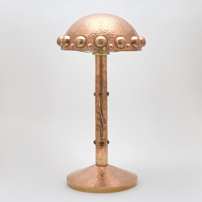 Lot 244 - Austrian Secessionist Hand-Hammered Brass and Glass Cabochon-Set Table Lamp