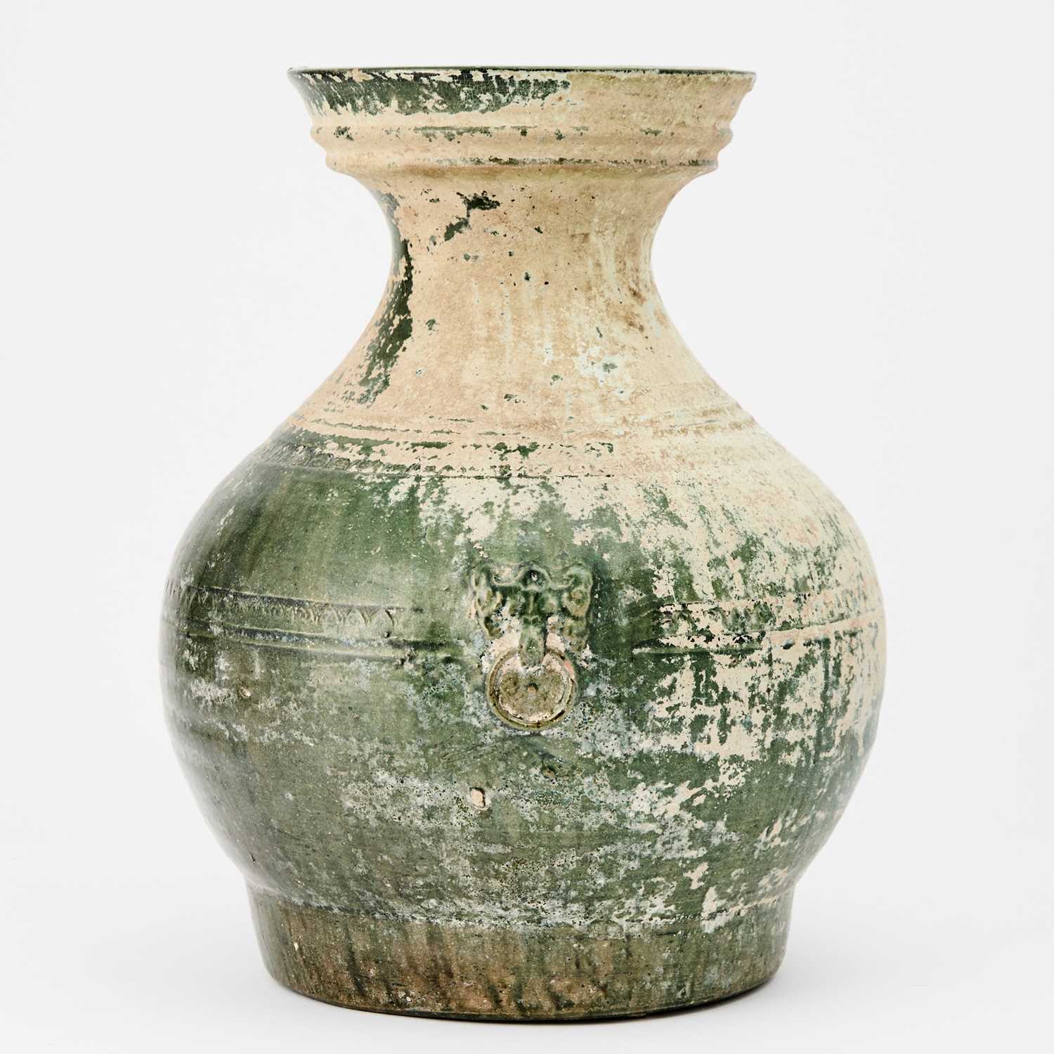 Lot 67 - A Chinese Green Glazed Pottery Jar, Hu