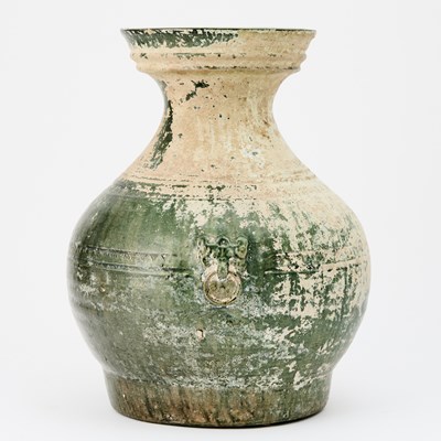 Lot 67 - A Chinese Green Glazed Pottery Jar, Hu