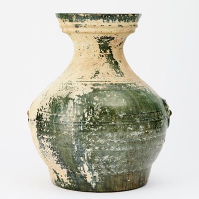 Lot 67 - A Chinese Green Glazed Pottery Jar, Hu