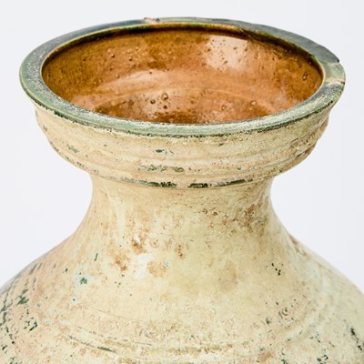 Lot 67 - A Chinese Green Glazed Pottery Jar, Hu