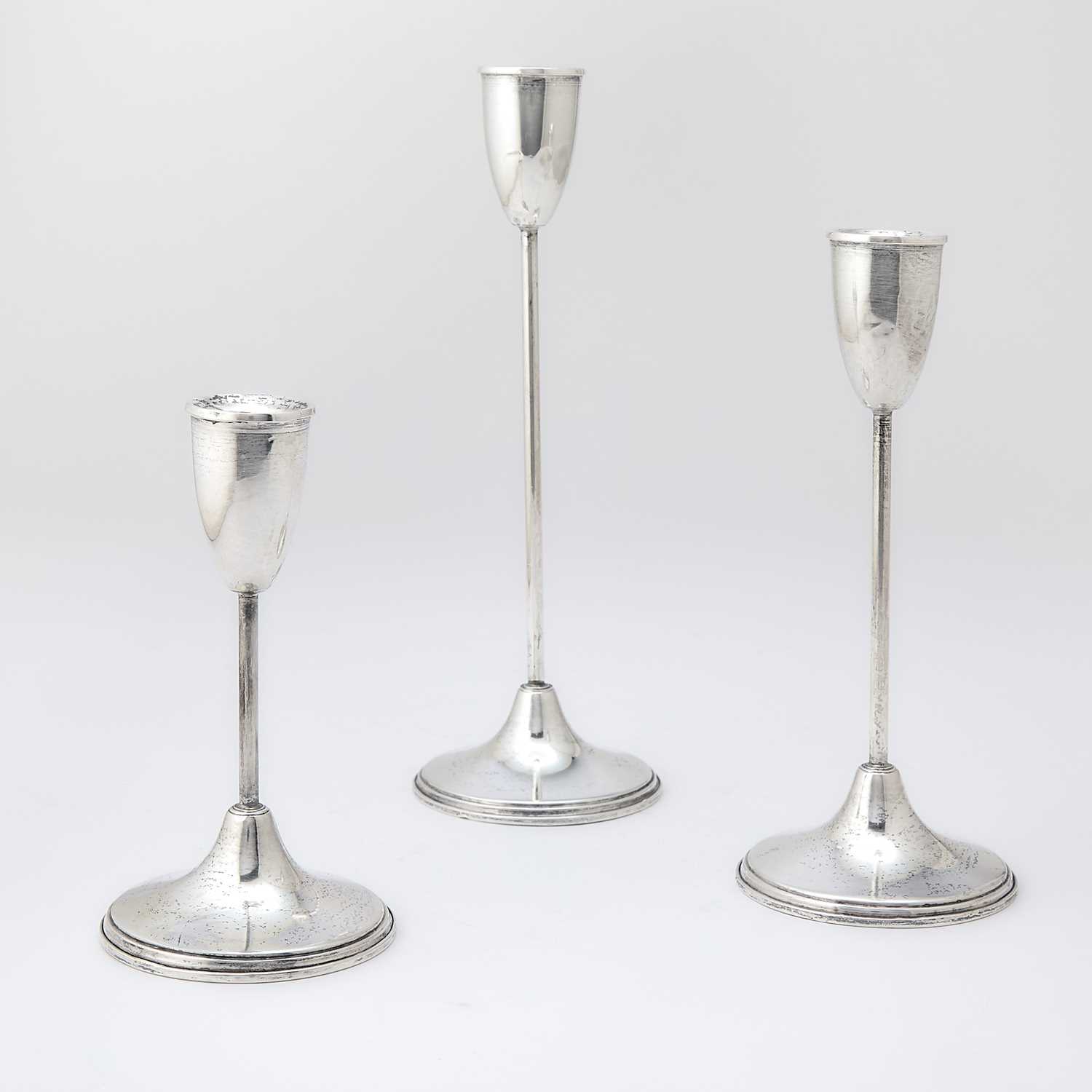 Lot 221 - Graduated Set of Three American Sterling Silver Candlesticks