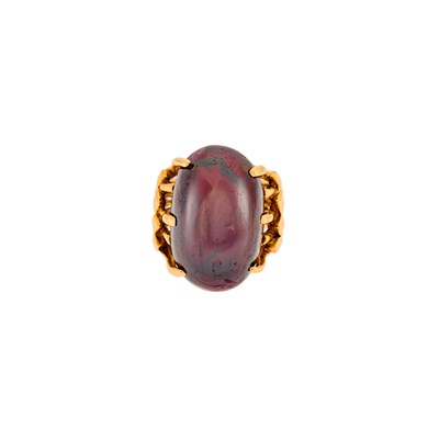 Lot 1081 - Gold and Cabochon Garnet Ring