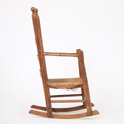 Lot 146 - Cherry and Elm Rush Seat Rocking Chair