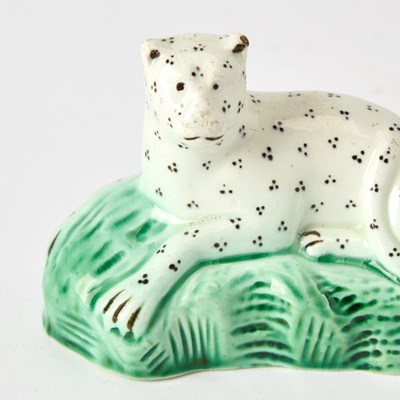 Lot 99 - Four English Pottery Figures of Leopards