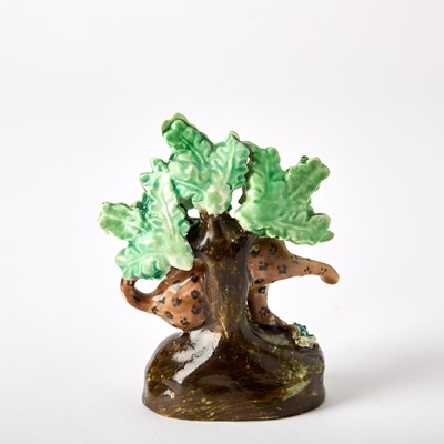Lot 99 - Four English Pottery Figures of Leopards