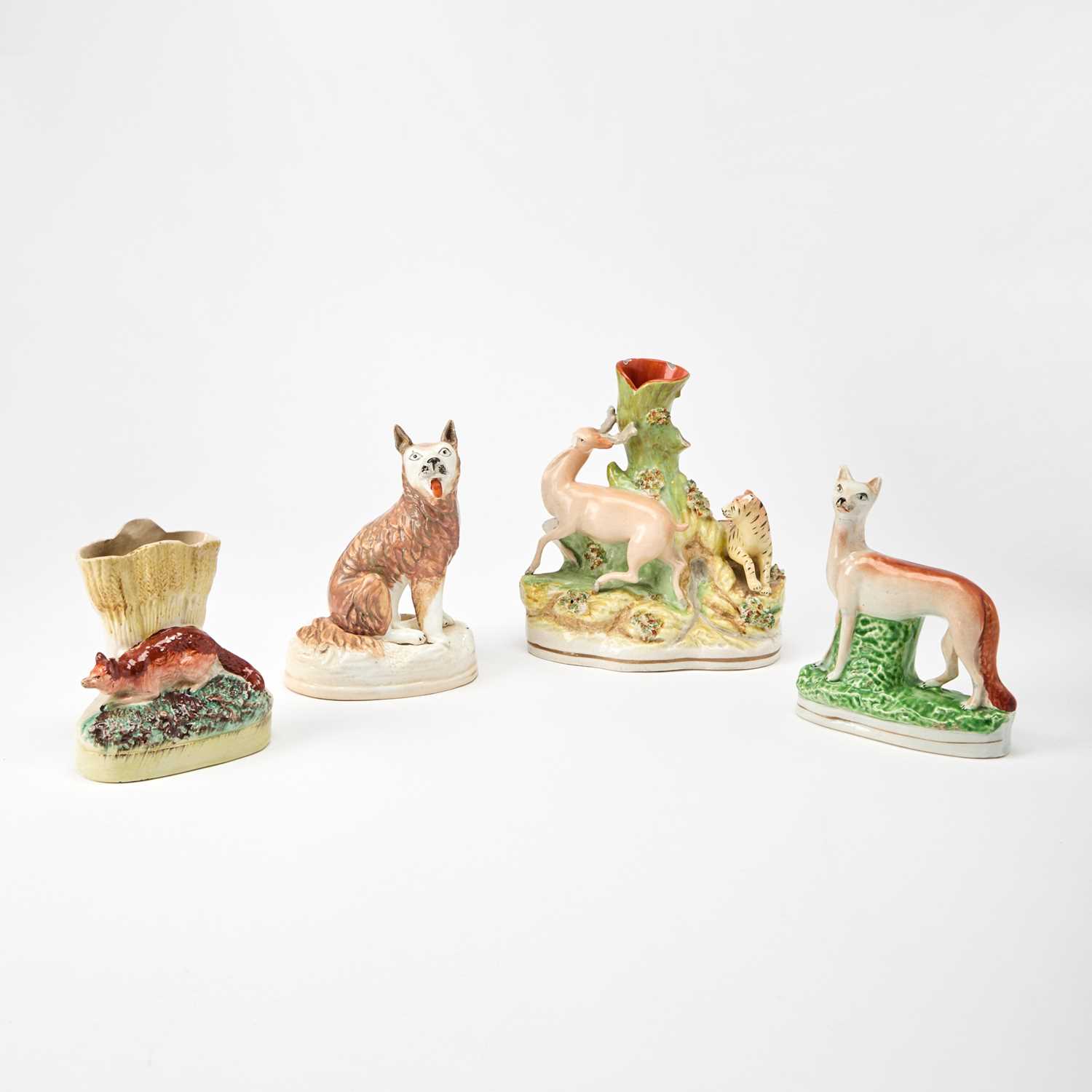 Lot 103 - Group of Staffordshire Figures of Foxes