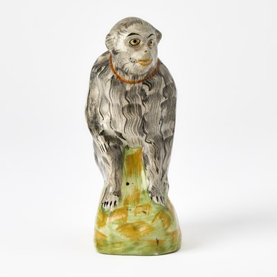 Lot 87 - Staffordshire Figure of a Seated Monkey