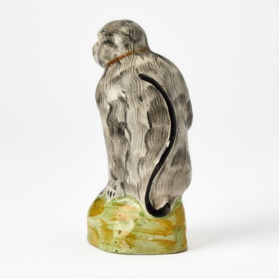 Lot 87 - Staffordshire Figure of a Seated Monkey