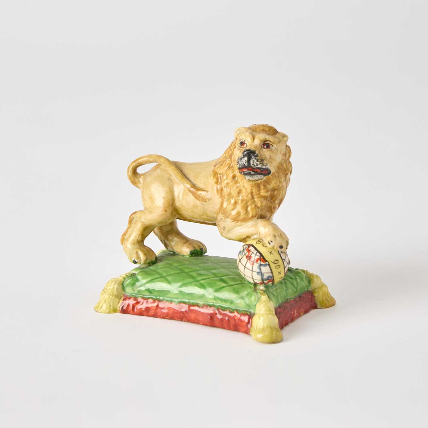 Lot 101 - Staffordshire Pearlware Figure of a Lion