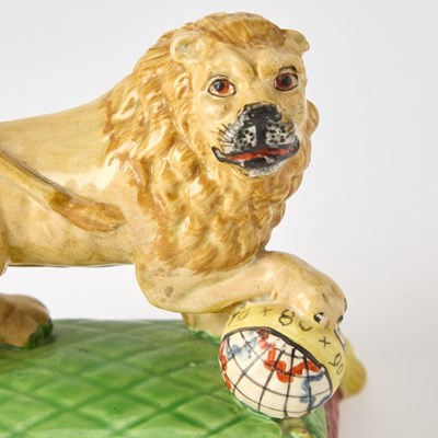 Lot 101 - Staffordshire Pearlware Figure of a Lion