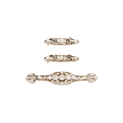 Lot 1194 - Three Gold, Platinum, Diamond and Button Pearl Pins