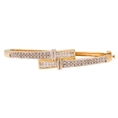 Lot 1176 - Two-Color Gold and Diamond Bangle Bracelet