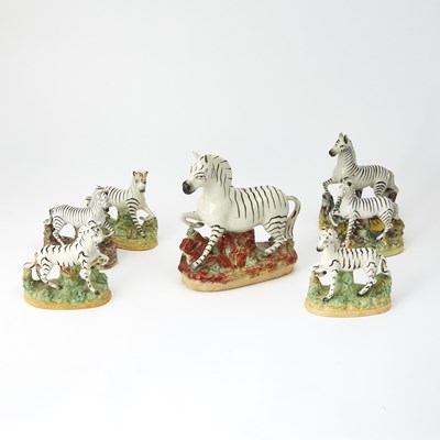 Lot 392 - Group of Seven Staffordshire Pottery Zebras
