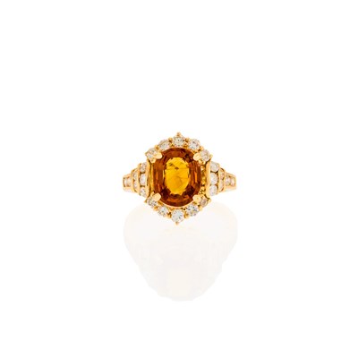 Lot 1032 - Gold, Orange Sapphire and Diamond Ring
