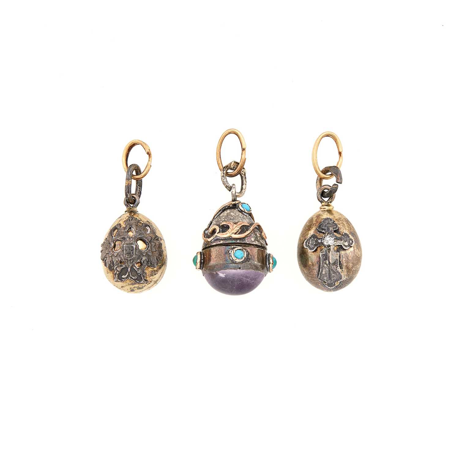 Lot 203 - Group of Three Russian and Russian Style Silver Pendant Eggs