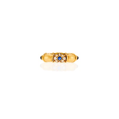 Lot 1036 - Tiffany & Co. Gold, Cabochon Sapphire and Diamond Band Ring
