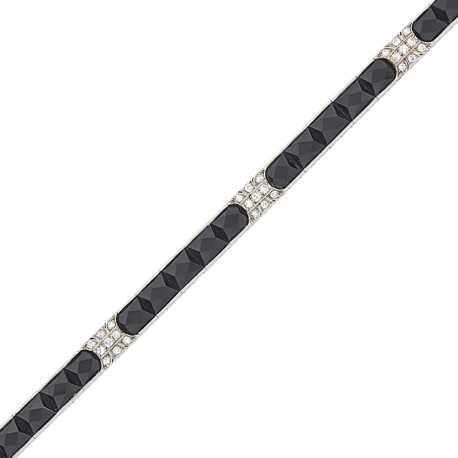 Lot 101 - Platinum, Black Onyx and Diamond Bracelet