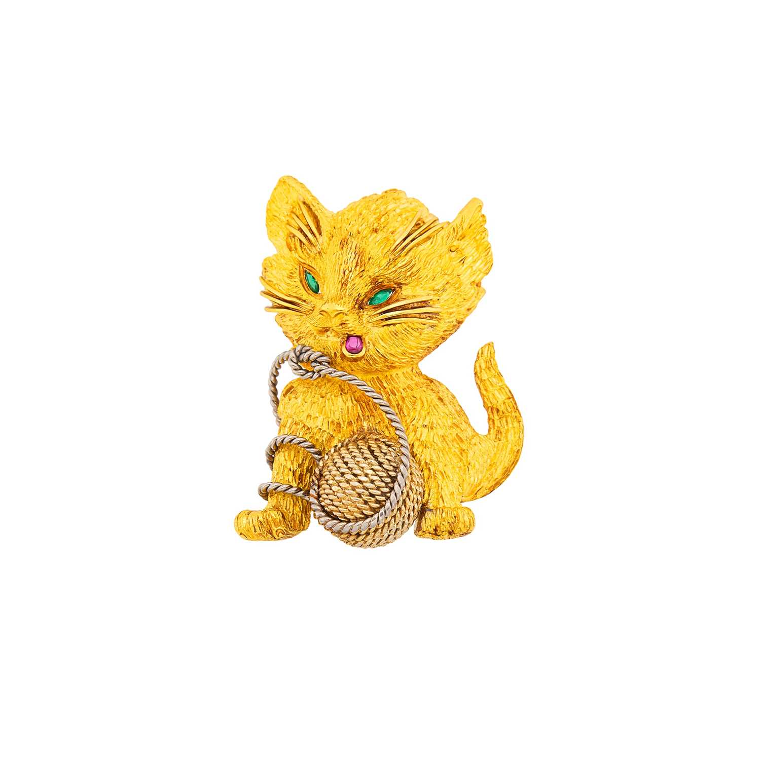 Lot 1112 - Tiffany & Co. High Karat Gold, White Gold, and Gem-Set Cat Clip-Brooch, France