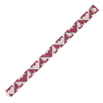 Lot 1101 - Enigma Tricolor Gold, Ruby and Diamond Heart Bracelet
