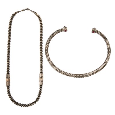 Lot 1281 - Two Silver, Gold and Red Glass Necklaces