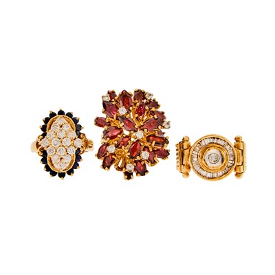 Lot 1260 - Three Gold, Garnet, Sapphire, Diamond and White Topaz Rings