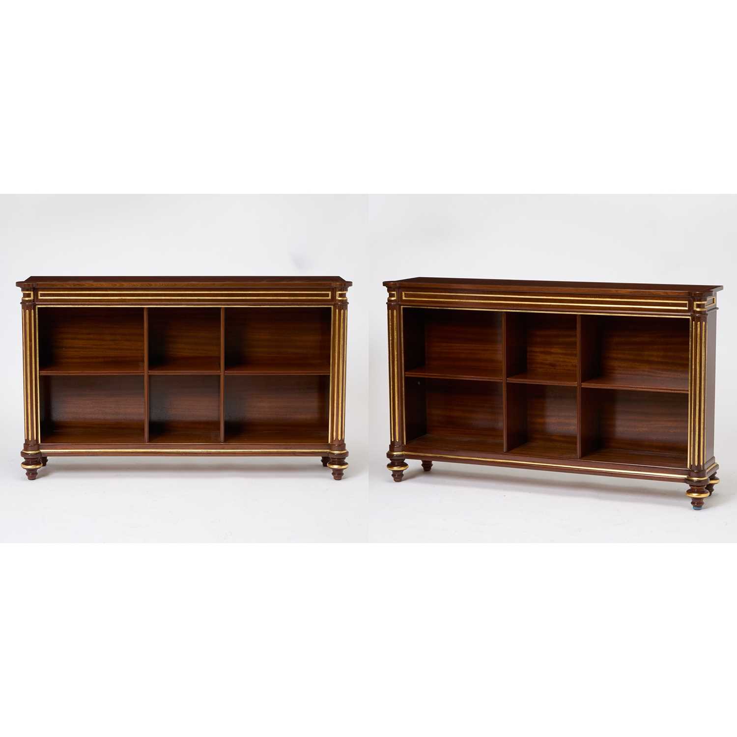 Lot 307 - Pair of Regency Style Parcel-Gilt Mahogany Bookcases