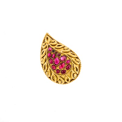 Lot 1219 - Gold and Cabochon Ruby Paisley Brooch
