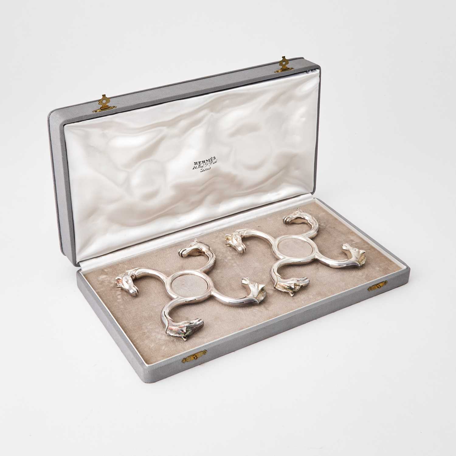 Lot 42 - Cased Pair of Hermès Silver Plated Bottle Coasters