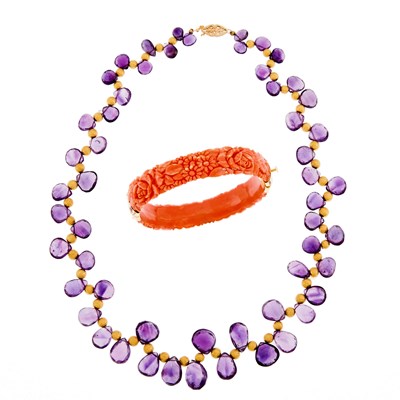 Lot 1167 - Amethyst and Gold Bead Necklace and Carved Coral and Gilt-Metal Bangle Bracelet