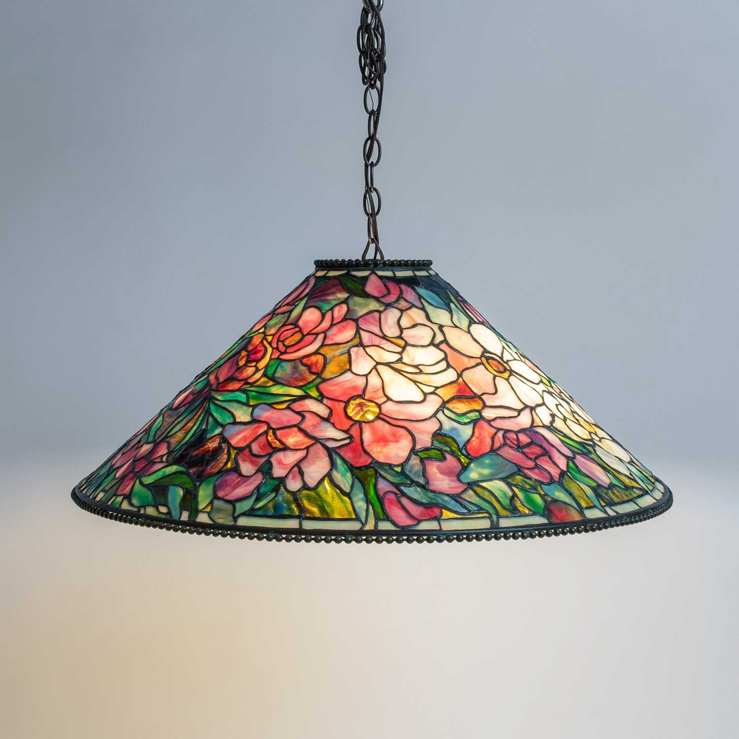 Lot 261 - Tiffany Studios Bronze and Leaded Glass "Floral Bouquet" Chandelier
