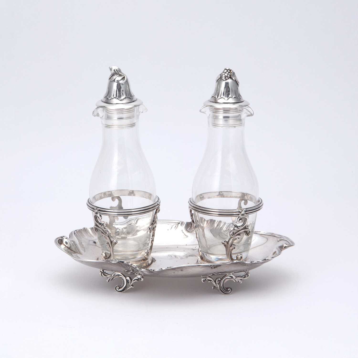 Lot 155 - French Louis XV Style Silver and Glass Cruet Set