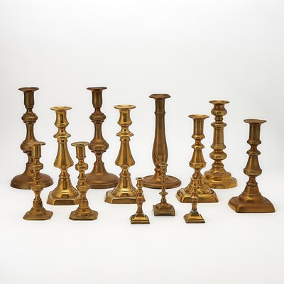 Lot 211 - Group of Thirteen Brass Candlesticks