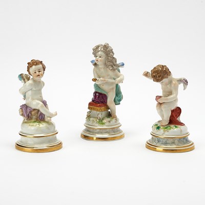 Lot 406 - Three Meissen Porcelain Figures of Cupid