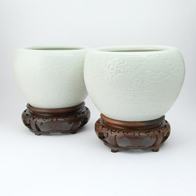 Lot 107 - A Pair of Chinese White Glazed Porcelain Jardinières
