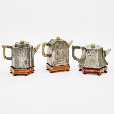 Lot 152 - Three Chinese Pewter-Encased Yixing Teapots