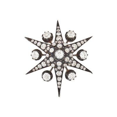 Lot 81 - Blackened Silver, Gold and Diamond Star Pendant-Brooch