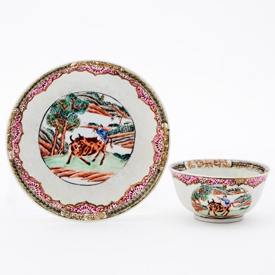 Lot 443 - A Chinese Slip-Decorated Famille Rose Porcelain Saucer and Cup