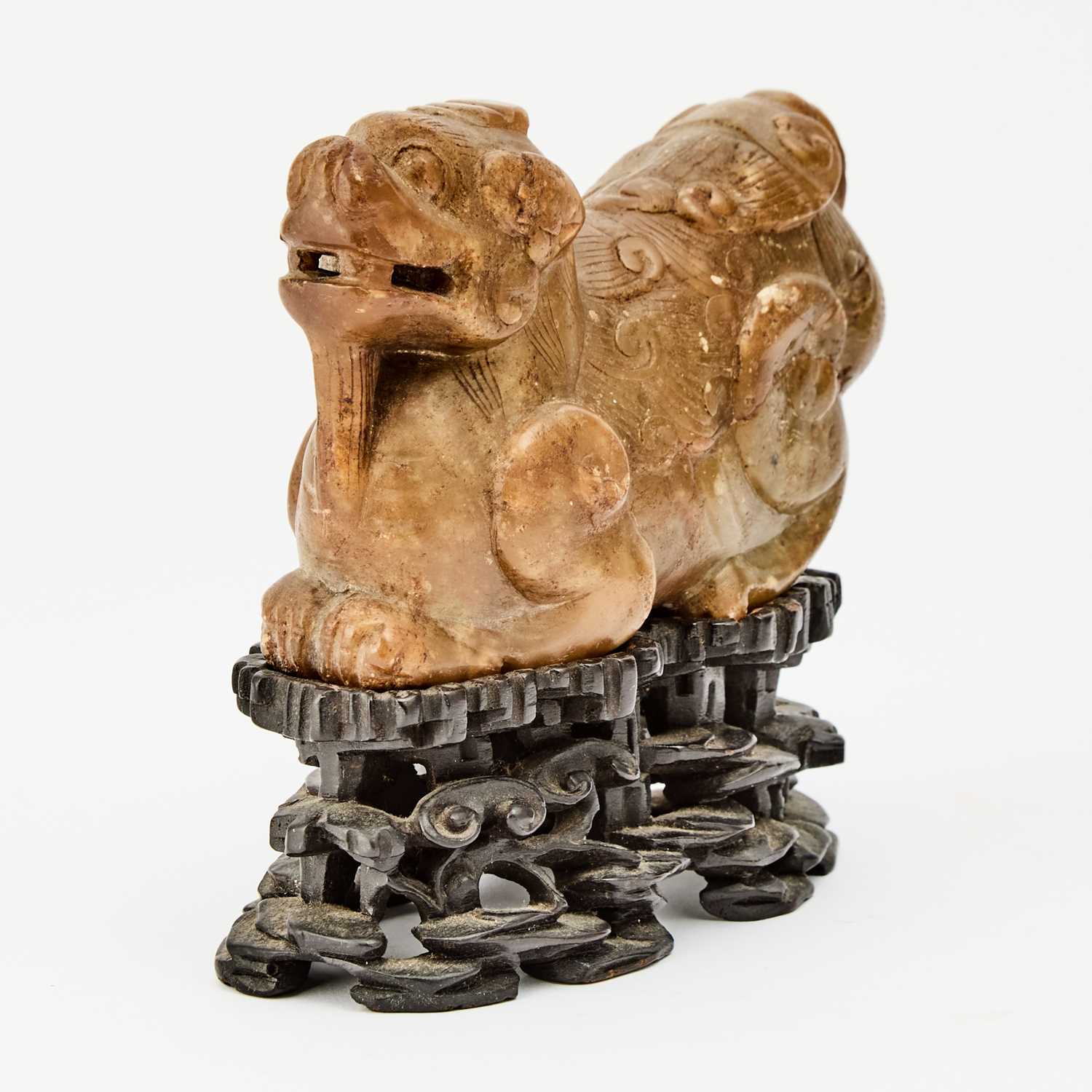 Lot 61 - A Chinese Soapstone Carving of a Recumbent Mythical Beast