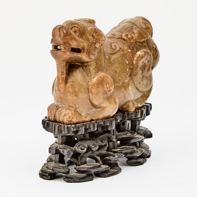 Lot 61 - A Chinese Soapstone Carving of a Recumbent Mythical Beast